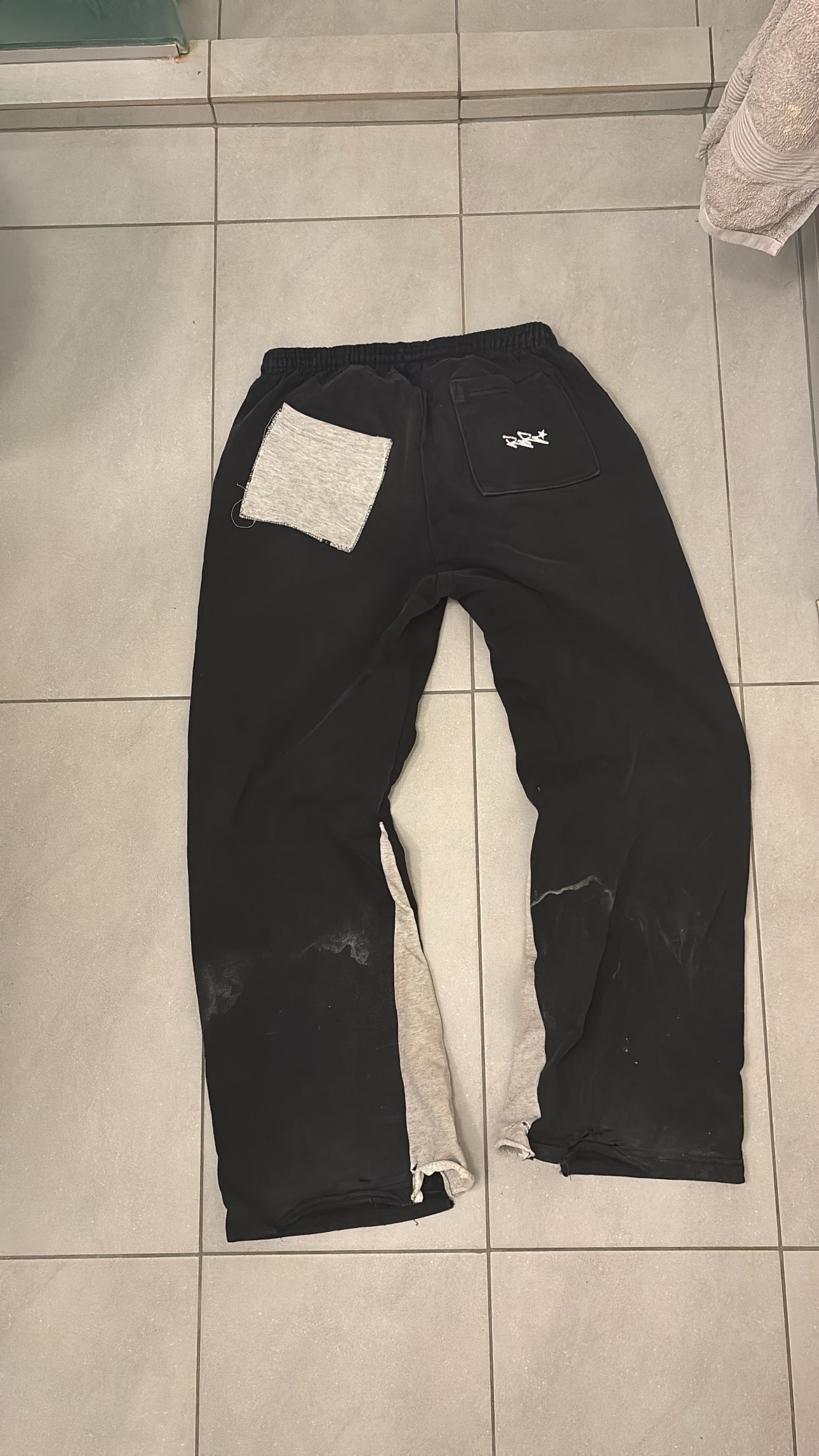 Recycled Reykjavik roses flared sweatpants with mismatch pockets